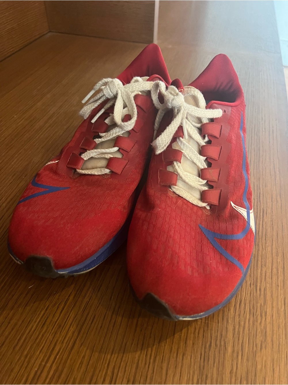 Nike Red Athletic Men's Sneakers with White Laces and Blue Accents